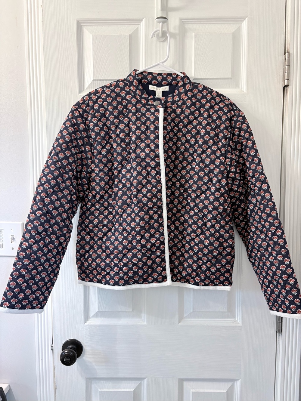 Chelsea & Violet Navy Quilted Jacket with Floral Print